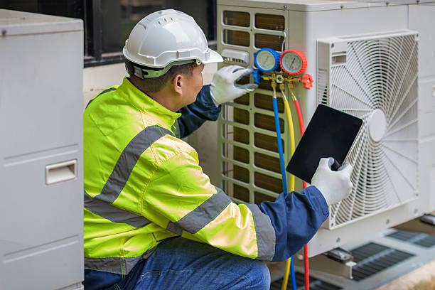 Professional Hvac technician working in Coal Valley, IL